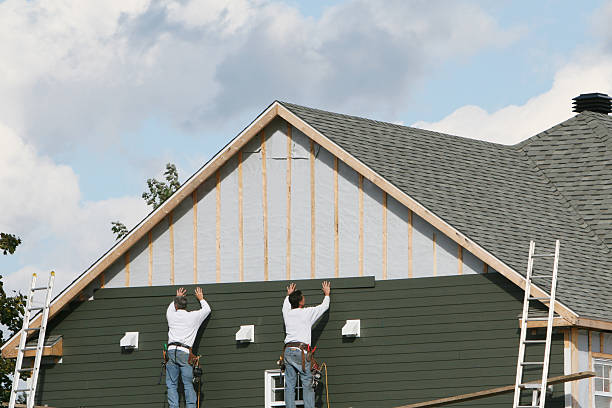 Professional Siding technician working in Bolton, CT